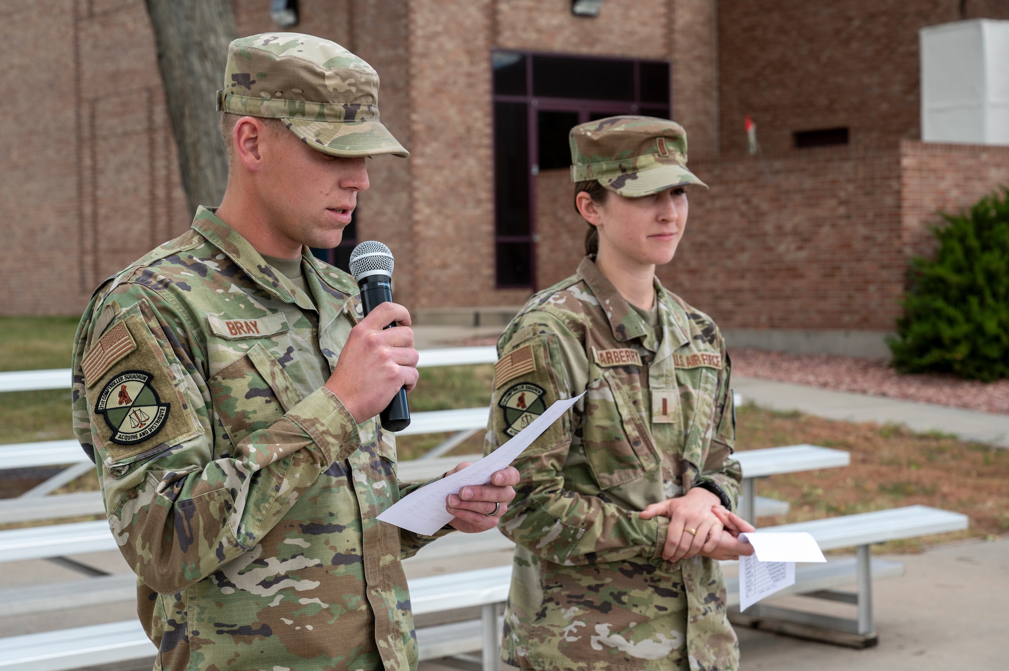 U.S. Air Force Staff Sgt. Brandon Bray, 21st Comptroller Squadron finical analyst supervisor, left, and U.S. Air Force 2nd Lt. Kayla Scarberry, 21st CPTS budget analyst, read the number of American prisoners of war and those missing in action from each state before the Space Base Delta 1 24-hour POW/MIA Remembrance Run at Peterson Space Force Base, Colorado, Sept. 15, 2022. at present, more than 81,500 Americans remain missing from World War two, the Korean War, the Vietnam War, the Cold War, and the Gulf Wars/other conflicts. Out of the more than 81,500 missing, 75% of the losses are located in the Indo-Pacific, and over 41,000 of the missing are presumed lost at sea. (U.S. Space Force photo by Airman 1st Class Aaron Edwards.)
