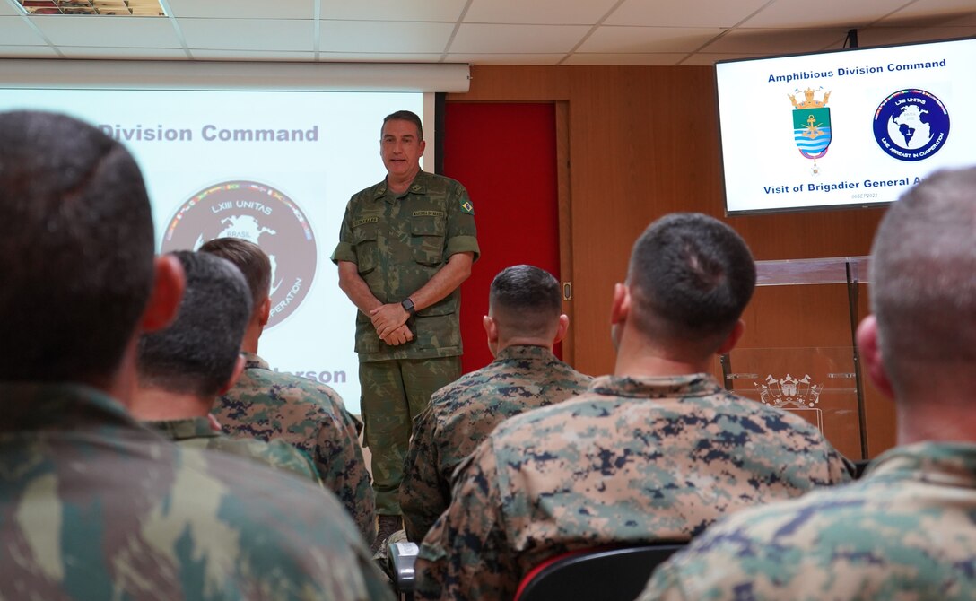 Vice-Almirante Marcelo Guimarães Dias (Rear Adm. Brazilian Marine Corps), commander of Brazil’s Amphibious Division, delivers a Brazilian Marine Corps capabilities brief to Brig. Gen. Len "Loni" Anderson, commanding general of 4th Marine Aircraft Wing, Marine Forces Reserve, and senior Marine Corps leaders from both Brazil and the U.S.A. at the Brazilian Marine Corps Division Headquarters, Ilha do Governador, Rio de Janeiro, Sept. 6, 2022. For the last 63 years, UNITAS has developed and sustained relationships that improve the capacity of our reemerging and enduring maritime partners to achieve common objectives. Additionally, the military-to-military exchanges foster mutual cooperation and understanding among participating navies and marine corps. (U.S. Marine Corps photo by Maj. Jeremy Wheeler)