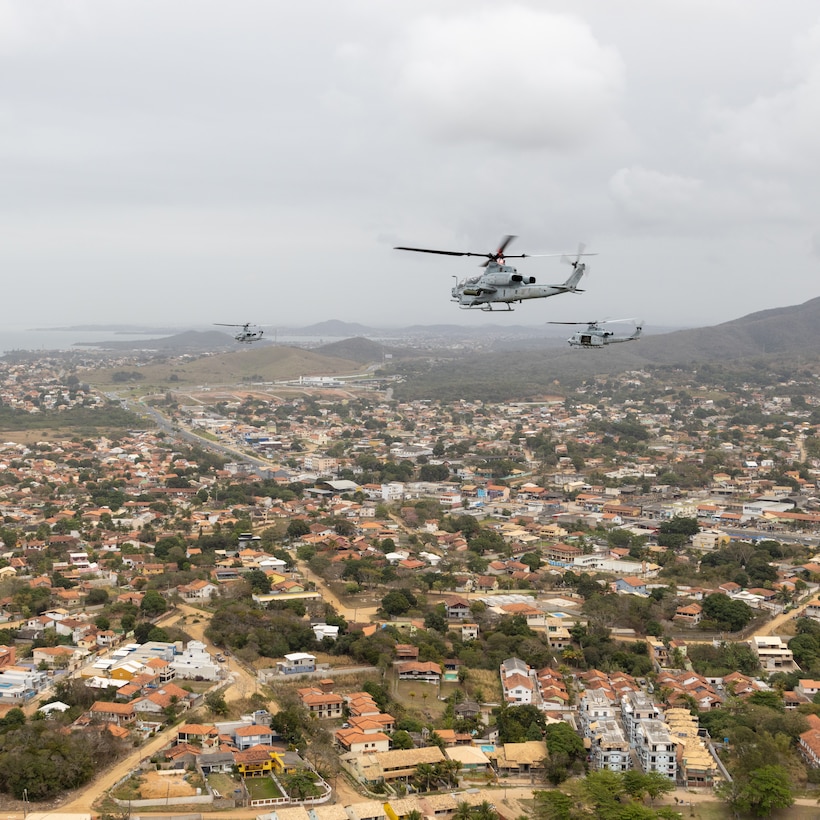 U.S. Marines with Marine Light Attack Helicopter Squadron (HMLA) 773, 4th Marine Aircraft Wing, Marine Forces Reserve in support of Special Purpose Marine Air-Ground Task Force UNITAS LXIII, conduct flight operations near the Christ the Redeemer statue at Corcovado Mountain, Rio de Janeiro, during exercise UNITAS LXIII, Sept. 12, 2022. UNITAS is the world's longest-running annual multinational maritime exercise that focuses on enhancing interoperability among multiple nations and joint forces during littoral and amphibious operations in order to build on existing regional partnerships and create new enduring relationships that promote peace, stability, and prosperity in the U.S. Southern Command’s area of responsibility. (U.S. Marine Corps photo by Cpl. Jonathan L. Gonzalez)