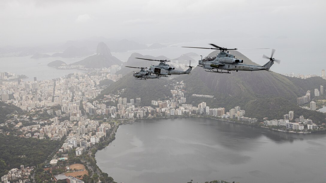 U.S. Marines with Marine Light Attack Helicopter Squadron (HMLA) 773, 4th Marine Aircraft Wing, Marine Forces Reserve in support of Special Purpose Marine Air-Ground Task Force UNITAS LXIII, conduct flight operations near the Christ the Redeemer statue at Corcovado Mountain, Rio de Janeiro, during exercise UNITAS LXIII, Sept. 12, 2022. UNITAS develops and sustains relationships that improve the capacity of our reemerging and enduring maritime partners to achieve common objectives. Additionally, the military-to-military exchanges foster mutual cooperation and understanding among participating navies and marine corps. (U.S. Marine Corps photo by Cpl. Jonathan L. Gonzalez)