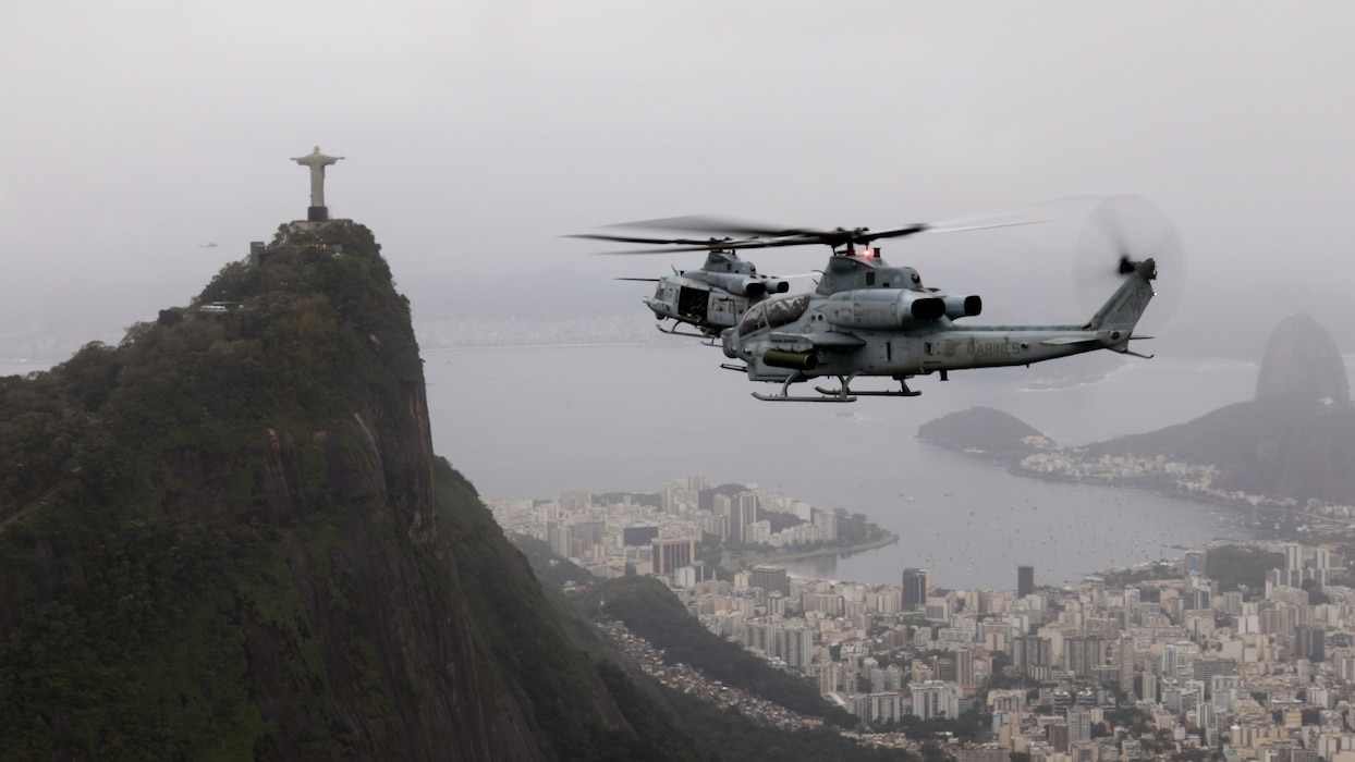 U.S. Marines with Marine Light Attack Helicopter Squadron (HMLA) 773, 4th Marine Aircraft Wing, Marine Forces Reserve in support of Special Purpose Marine Air-Ground Task Force UNITAS LXIII, conduct flight operations near the Christ the Redeemer statue at Corcovado Mountain, Rio de Janeiro, during exercise UNITAS LXIII, Sept. 12, 2022. UNITAS, which is Latin for “unity,” was conceived in 1959 and has taken place annually since first conducted in 1960. This year marks the 63rd iteration of the world’s longest-running annual multinational maritime exercise. Additionally, this year Brazil celebrated its bicentennial, a historical milestone commemorating 200 years of the country’s independence. (U.S. Marine Corps photo by Cpl. Jonathan L. Gonzalez)