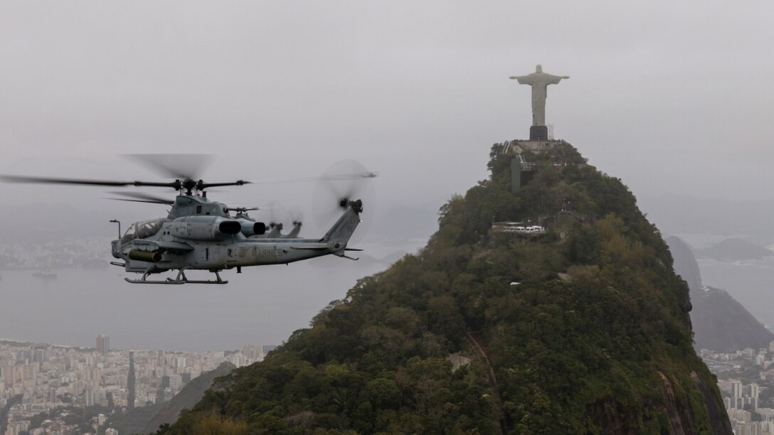 U.S. Marines with Marine Light Attack Helicopter Squadron (HMLA) 773, 4th Marine Aircraft Wing, Marine Forces Reserve in support of Special Purpose Marine Air-Ground Task Force UNITAS LXIII, conduct flight operations near the Christ the Redeemer statue at Corcovado Mountain, Rio de Janeiro, during exercise UNITAS LXIII, Sept. 12, 2022. UNITAS, which is Latin for “unity,” was conceived in 1959 and has taken place annually since first conducted in 1960. This year marks the 63rd iteration of the world’s longest-running annual multinational maritime exercise. Additionally, this year Brazil will celebrate its bicentennial, a historical milestone commemorating 200 years of the country’s independence. (U.S. Marine Corps photo by Cpl. Jonathan L. Gonzalez)