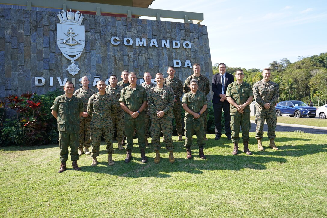 Senior Brazilian and United States Marines, and their staffs, pose for a photo outside of the Brazilian Marine Corps Division Headquarters at the start of Exercise UNITAS LXIII at Ilha do Governador, Rio de Janeiro, Sept. 6, 2022. UNITAS, which is Latin for “unity,” was conceived in 1959 and has taken place annually since first conducted in 1960. This year marks the 63rd iteration of the world’s longest-running annual multinational maritime exercise. Additionally, this year Brazil will celebrate its bicentennial, a historical milestone commemorating 200 years of the country’s independence. (U.S. Marine Corps photo by Maj. Jeremy Wheeler)