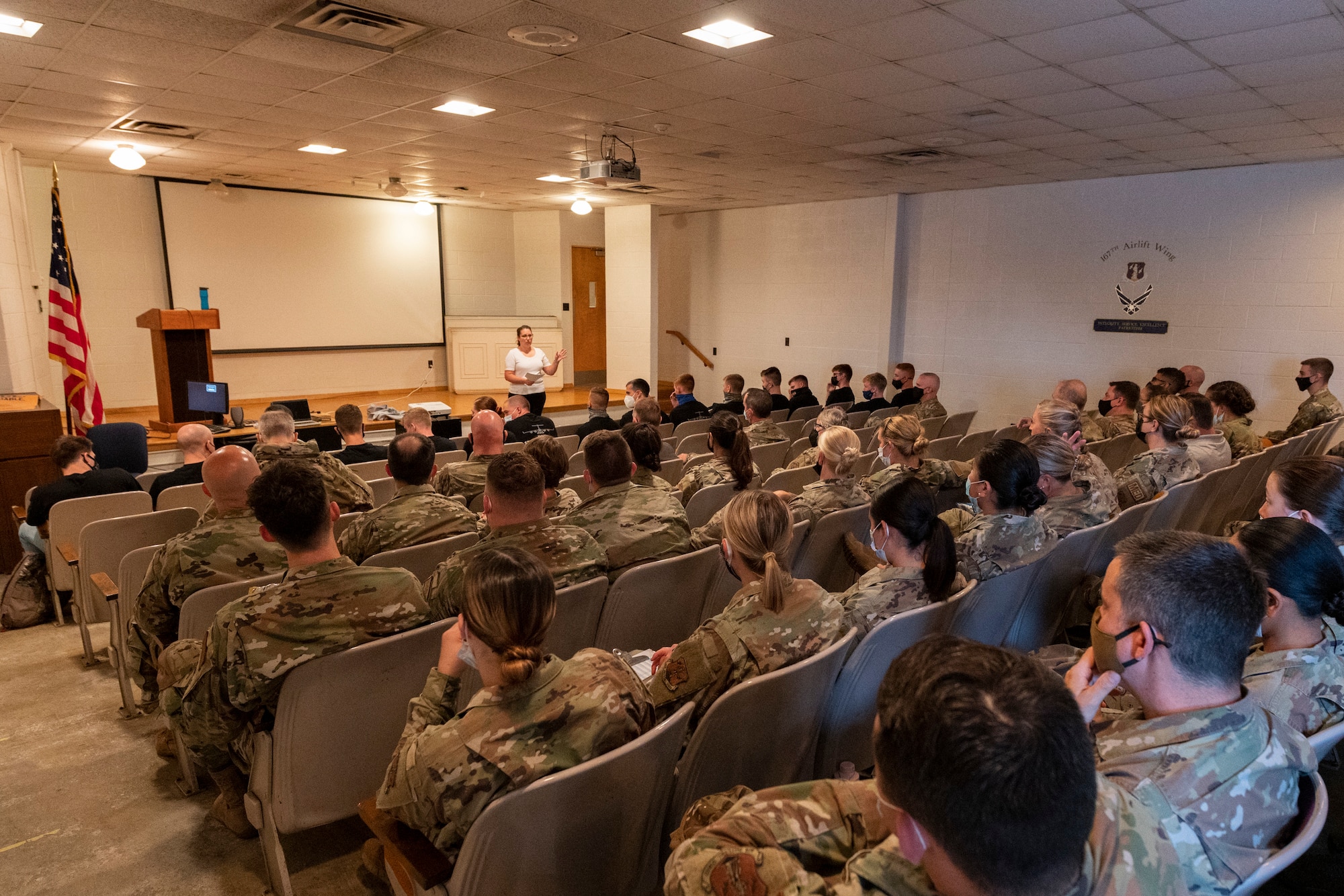 Airmen from the 167th Airlift Wing listen to Christina Firescue-Williams, 167th director of psychological health, during a suicide awareness and prevention training in the 167th base auditorium, Martinsburg, West Virginia, Sept. 11, 2022.