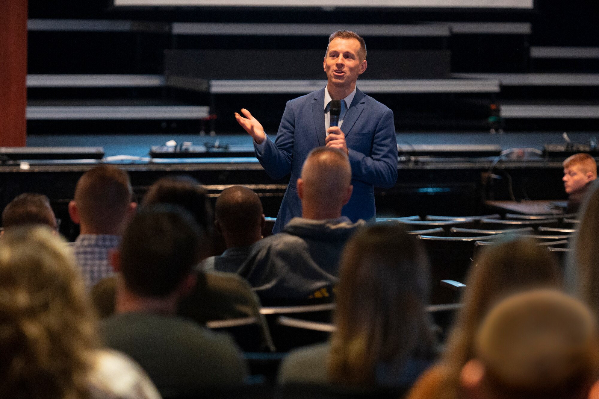 Lt. Col. Nathan Graeser, a social worker, chaplain for the California National Guard and facilitator for the Brothers at War Resiliency Workshop, speaks to 167th Airlift Wing Airmen and family members during the workshop held at Martinsburg High School, Martinsburg, West Virginia, September 11, 2022.