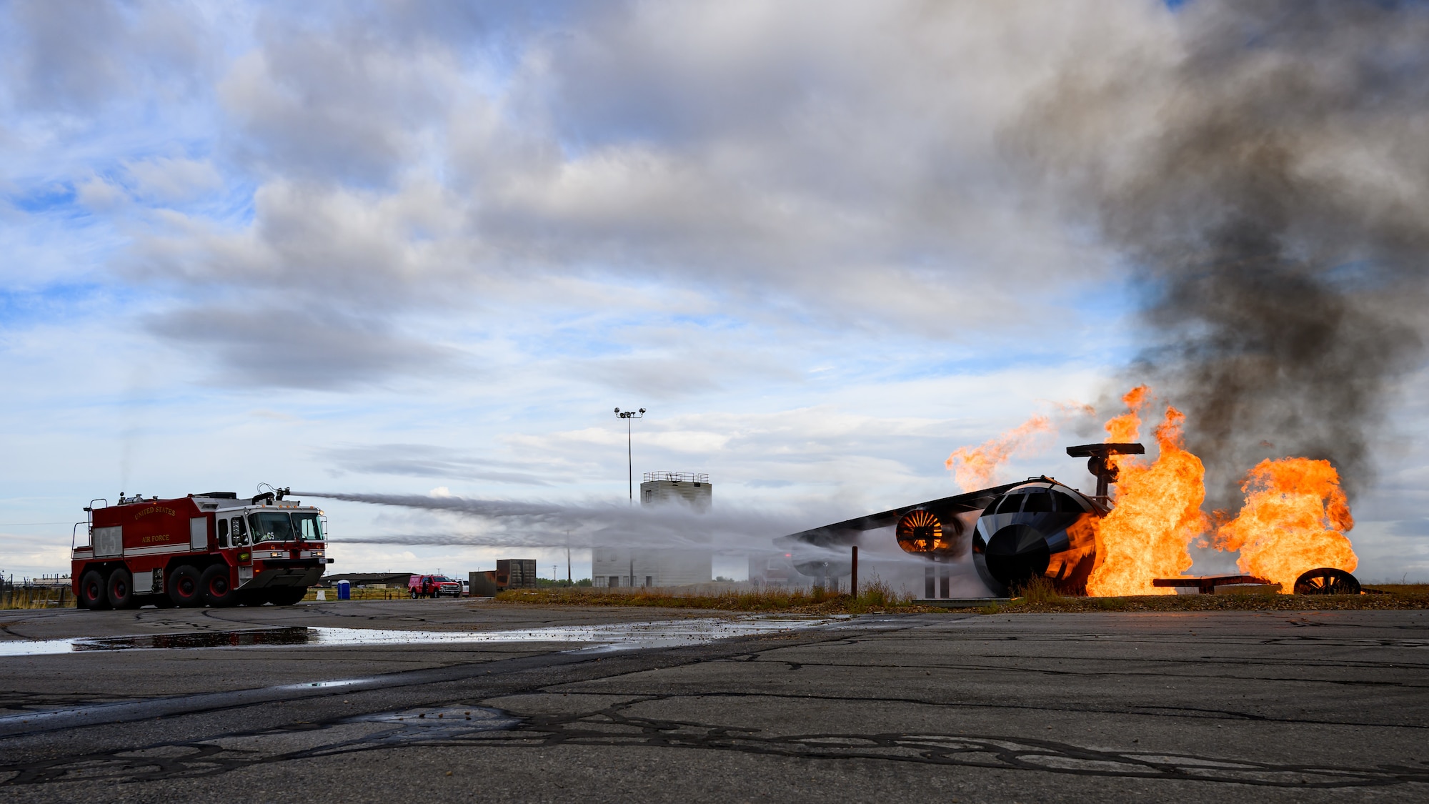 Firefighters with the 775th Fire & Emergency Services Flight respond to a simulated attack and aircraft fire during a Phase 2 exercise at Hill Air Force Base, Utah, Sept. 14, 2022.