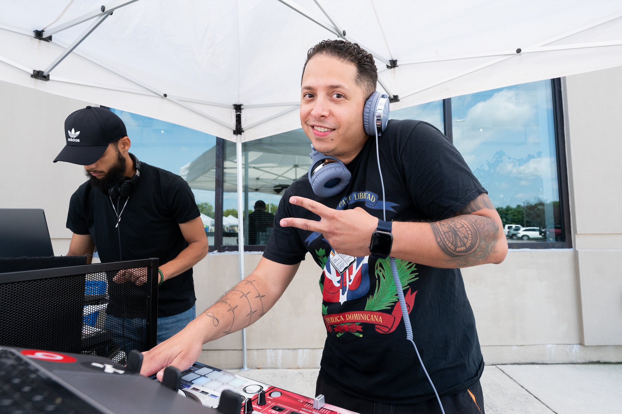 Staff Sgt. Emmanuel Alba, 436th Force Support Squadron noncommissioned officer in charge of retentions, DJs at the Hispanic Heritage Month Block Party on Dover Air Force Base, Delaware, Sept. 15, 2022. National Hispanic Heritage
Month is observed from Sept. 15 to Oct. 15 in recognition and celebration of Latin American history and culture. (U.S. Air Force photo by Mauricio Campino)