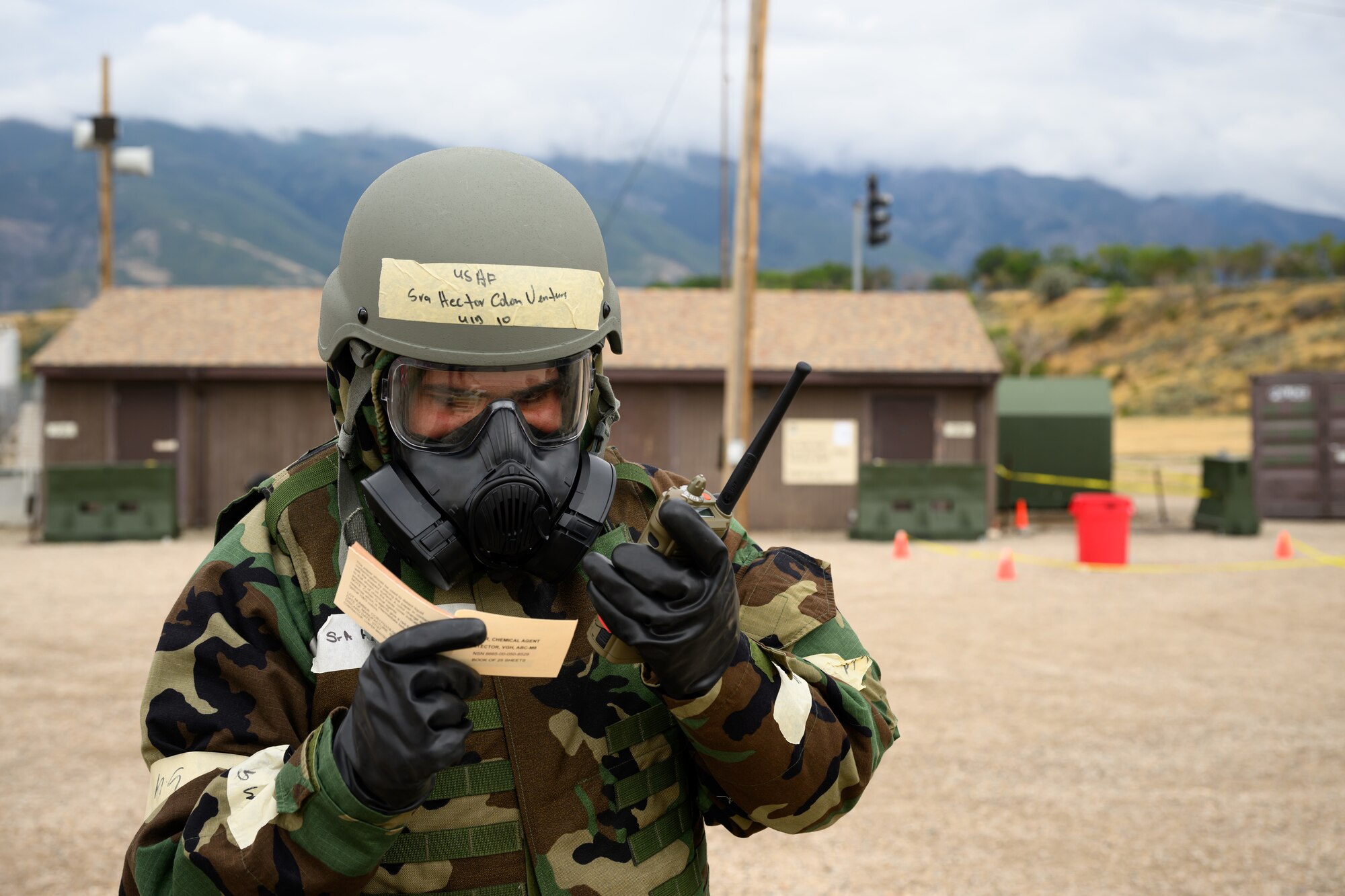 Senior Airman Hector Colon Ventura, 75th Logistics Readiness Squadron, reports a simulated chemical agent detection during a Phase 2 exercise at Hill Air Force Base, Utah, Sept. 14, 2022.