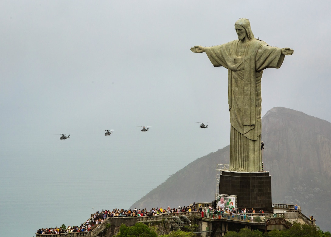 A division of helicopters from Marine Light Attack Helicopter Squadron (HMLA) 773, 4th Marine Aircraft Wing, Marine Forces Reserve in support of Special Purpose Marine Air-Ground Task Force UNITAS LXIII, conduct flight operations near the Christ the Redeemer statue at Corcovado Mountain, Rio de Janeiro, during exercise UNITAS LXIII, Sept. 12, 2022. UNITAS, which is Latin for “unity,” was conceived in 1959 and has taken place annually since first conducted in 1960. This year marks the 63rd iteration of the world’s longest-running annual multinational maritime exercise. Additionally, this year Brazil celebrated its bicentennial, a historical milestone commemorating 200 years of the country’s independence. (U.S. Marine Corps photo by Cpl. Colton K. Garrett)