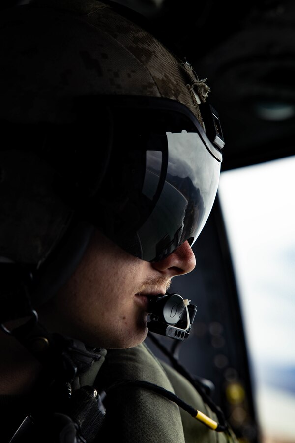 U.S. Marine Corps Cpl. Patrick Ryan, a crew chief with Marine Light Attack Helicopter Squadron (HMLA) 773, 4th Marine Aircraft Wing, Marine Forces Reserve in support of Special Purpose Marine Air-Ground Task Force UNITAS LXIII, looks out the side door of a UH-1Y Venom helicopter during flight operations near the Christ the Redeemer statue at Corcovado Mountain, Rio de Janeiro, during exercise UNITAS LXIII, Sept. 12, 2022. UNITAS, which is Latin for “unity,” was conceived in 1959 and has taken place annually since first conducted in 1960. This year marks the 63rd iteration of the world’s longest-running annual multinational maritime exercise. Additionally, this year Brazil celebrated its bicentennial, a historical milestone commemorating 200 years of the country’s independence. Ryan is a native of Tavares, FL. (U.S. Marine Corps photo by Cpl. Colton K. Garrett)