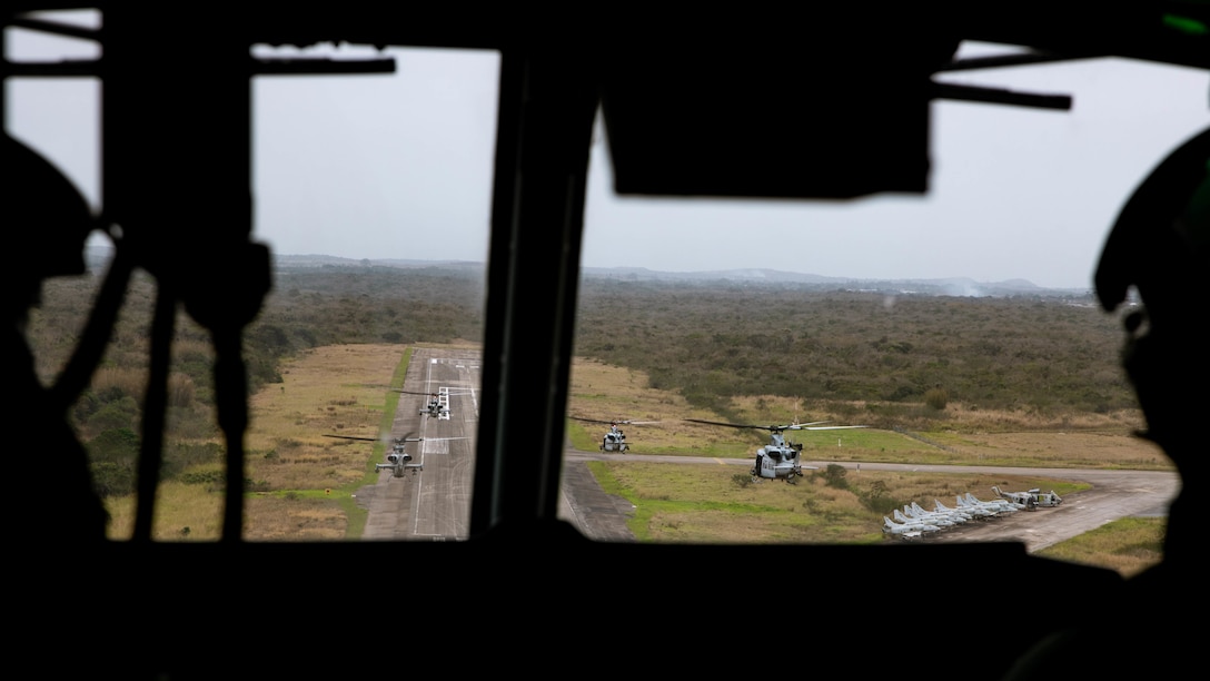 A division of helicopters from Marine Light Attack Helicopter Squadron (HMLA) 773, 4th Marine Aircraft Wing, Marine Forces Reserve in support of Special Purpose Marine Air-Ground Task Force UNITAS LXIII, prepare to land after conducting flight operations near the Christ the Redeemer statue at Corcovado Mountain, Rio de Janeiro, during exercise UNITAS LXIII, Sept. 12, 2022. UNITAS, which is Latin for “unity,” was conceived in 1959 and has taken place annually since first conducted in 1960. This year marks the 63rd iteration of the world’s longest-running annual multinational maritime exercise. Additionally, this year Brazil celebrated its bicentennial, a historical milestone commemorating 200 years of the country’s independence. (U.S. Marine Corps photo by Cpl. Colton K. Garrett)