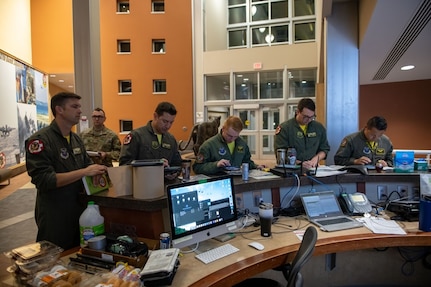 Aircrew, assigned to the 37th Bomb Squadron at Ellsworth Air Force Base, S.D., receive a pre-mission brief prior to a CONUS-to-CONUS flight into the Indo-Pacific region, Sept. 10, 2022.