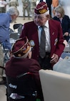 Clyde Cassidy and William Busier speak to each other before the annual POW/MIA Day ceremony at Camp Johnson, Vermont, on Sept. 16, 2022. POW/MIA Day is observed on the third Friday of each September to honor veterans who were held as prisoners of war or who are missing in action. Cassidy was held by Nazis for 15 months, including a 70-day forced march across parts of Europe. Busier was held at Stalag Luft 4 in Poland for nine months. (U.S. Army National Guard photo by Don Branum)