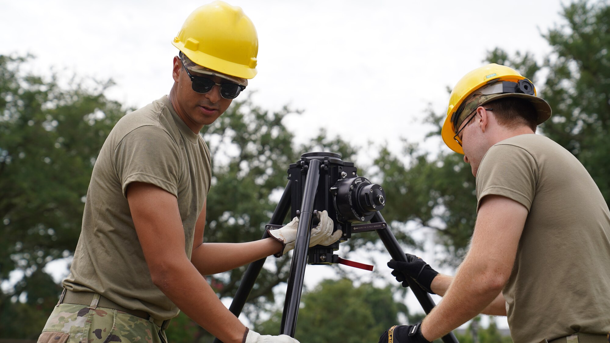 U.S. Air Force Airman Francisco Rebolledo and Airman 1st Class James Miller, 338th Training Squadron Radio Frequency Transmission Systems students, practice building a Blue Sky antenna mast during class at Keesler Air Force Base, Mississippi, Sept. 6, 2022. The 338th TRS specializes in two pipeline courses, RF Transmissions Systems and Network Operations.