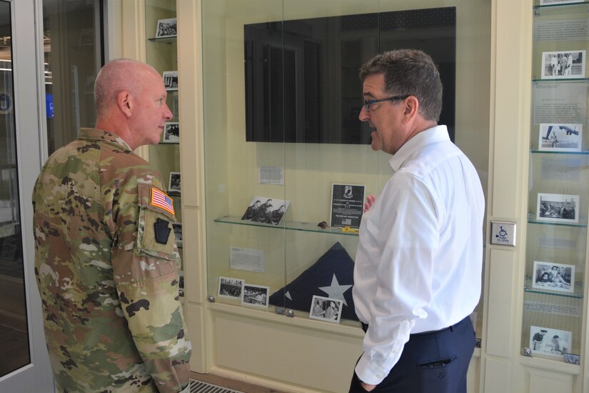 Eugene McFeely (right), Penn State’s senior director for veteran affairs and services, shows Pennsylvania Adjutant General Maj. Gen. Mark Schindler a display in the Penn State Student Veteran Center Sept. 16, 2022, in State College, Pa.