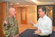 Pennsylvania Adjutant General Maj. Gen. Mark Schindler (left) talks with Eugene McFeely, Penn State’s senior director for veteran affairs and services, in the Penn State Student Veteran Center on Sept. 16, 2022, in State College, Pa.