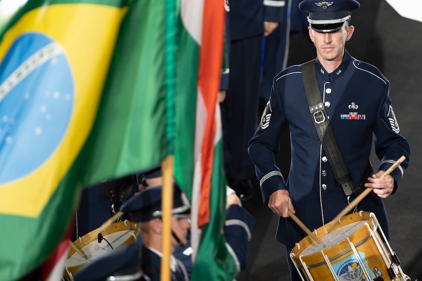 U.S. Air Force Master Sgt. Kenneth Riehman plays the drums during the closing ceremony at the Air Force 75th Anniversary Tattoo at Audi Field, Washington, D.C. on Sept. 15, 2022. Using music to bridge language, cultural, societal and socio-economic differences, The Band's performances advance international relationships and inspire positive and long-lasting impressions of the Air Force and the United States of America. (U.S. Air Force photo by Jason Treffry)
