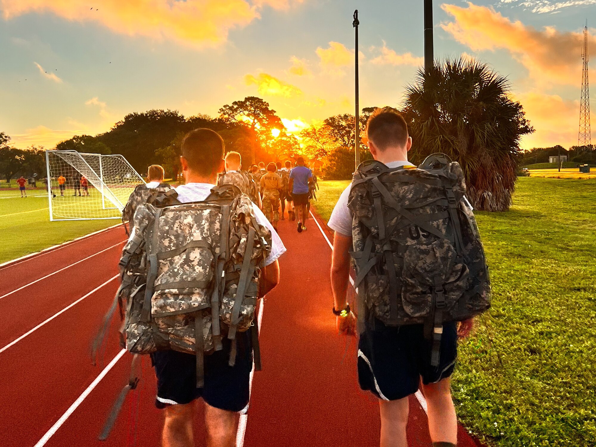 Airman assigned to the 6th Air Refueling Wing participate during a prisoner-of-war/missing in action 24-hour run at MacDill Air Force Base, Florida, Sept 16, 2022. The run was held to observe National POW/MIA Recognition Day and to honor those who went through being prisoners of war. (Courtesy Photo)