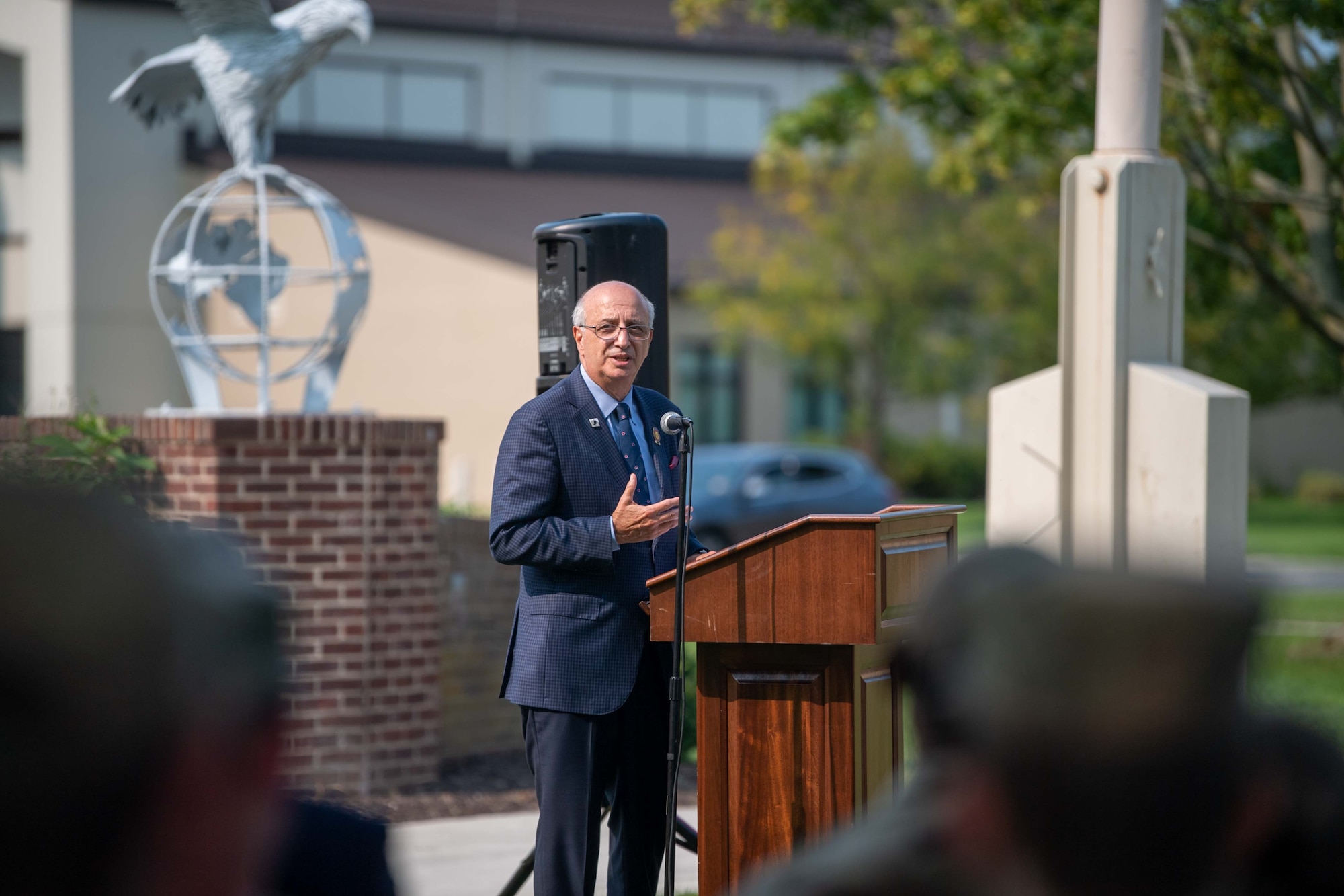 Ralph Galati, Air Force veteran and former prisoner of war, speaks at a retreat ceremony commemorating National POW/MIA Recognition Day on Dover Air Force Base, Delaware, Sept. 16, 2022. Galati was shot down over North Vietnam in 1972 and was a POW for 14 months. (U.S. Air Force photo by Senior Airman Faith Barron)