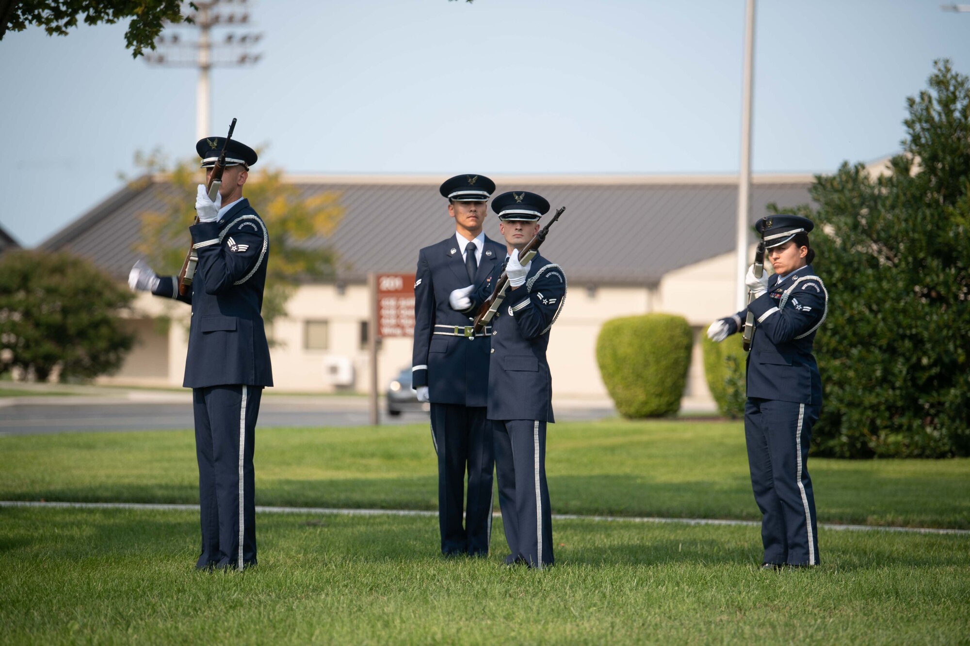 Dover Air Force Base Honor Guard members give a three volley salute during a retreat ceremony commemorating National POW/MIA Recognition Day on Dover AFB, Delaware, Sept. 16, 2022. The volley is an old battleground tradition in which the two warring sides would cease hostilities to clear their fallen from the battlefield. (U.S. Air Force photo by Senior Airman Faith Barron)