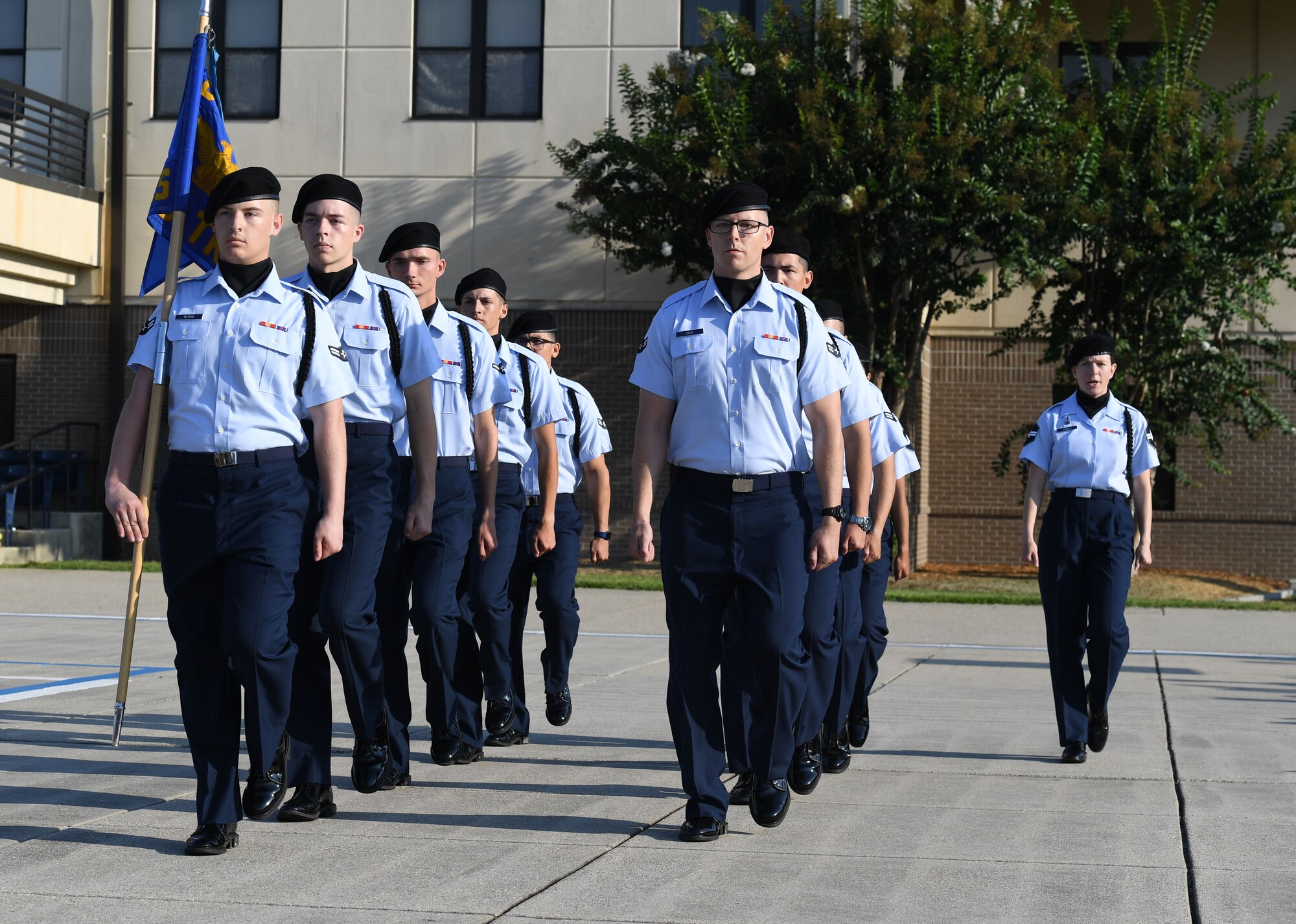 Members of the 338th Training Squadron regulation drill team perform during the 81st Training Group drill down on the Levitow Training Support Facility drill pad at Keesler Air Force Base, Mississippi, Sept. 16, 2022. Keesler trains more than 30,000 students each year. While in training, Airmen are given the opportunity to volunteer to learn and execute drill down routines. (U.S. Air Force photo by Kemberly Groue)