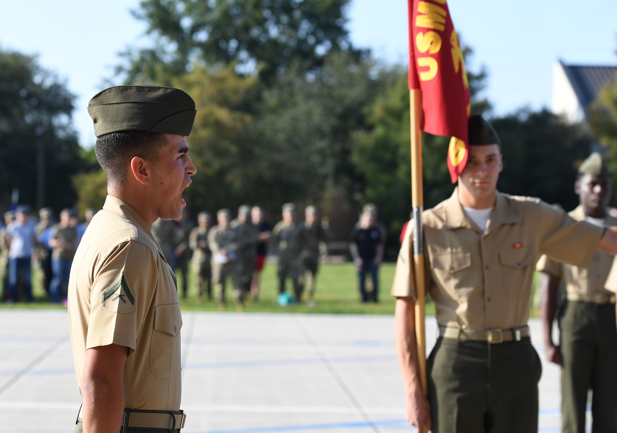 Members of the Keesler Marine Detachment regulation drill team perform during the 81st Training Group drill down on the Levitow Training Support Facility drill pad at Keesler Air Force Base, Mississippi, Sept. 16, 2022. Keesler trains more than 30,000 students each year. While in training, Airmen are given the opportunity to volunteer to learn and execute drill down routines. (U.S. Air Force photo by Kemberly Groue)