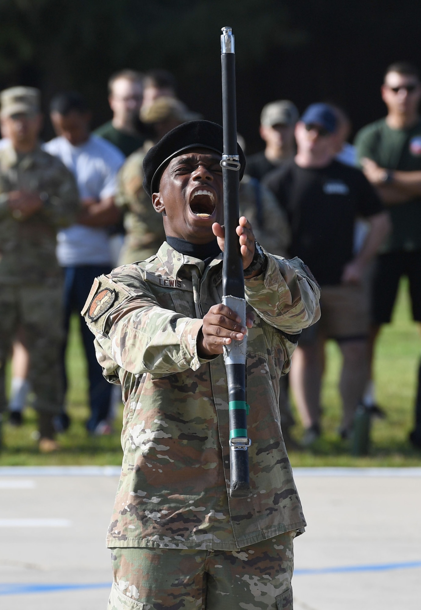 A member of the 334th Training Squadron freestyle drill team performs during the 81st Training Group drill down on the Levitow Training Support Facility drill pad at Keesler Air Force Base, Mississippi, Sept. 16, 2022. Keesler trains more than 30,000 students each year. While in training, Airmen are given the opportunity to volunteer to learn and execute drill down routines. (U.S. Air Force photo by Kemberly Groue)