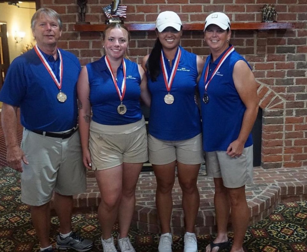 From left to right: Air Force coach Mr. Doug Quirie, SPC3 Cayla Clark (Space Force), 1st Lt Kimberly Liu, and Lt Col Linda Jeffery.  Air Force women captured team gold during the 2022 Armed Forces Golf Championship hosted by Army at Fort Belvoir, Virgina.  Championship features teams from the Army, Marine Corps, Navy (with Coast Guard players), and Air Force (with Space Force players).  Department of Defense Photo by Mr. Steven Dinote - Released.