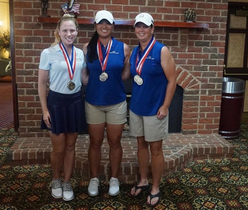 From left to right: LCDR Laurel Gill, 1st Lt Kimberly Liu, and Lt Col Linda Jeffery who captured bronze, silver and gold respectively during the 2022 Armed Forces Golf Championship hosted by Army at Fort Belvoir, Virgina.  Championship features teams from the Army, Marine Corps, Navy (with Coast Guard players), and Air Force (with Space Force players).  Department of Defense Photo by Mr. Steven Dinote - Released.