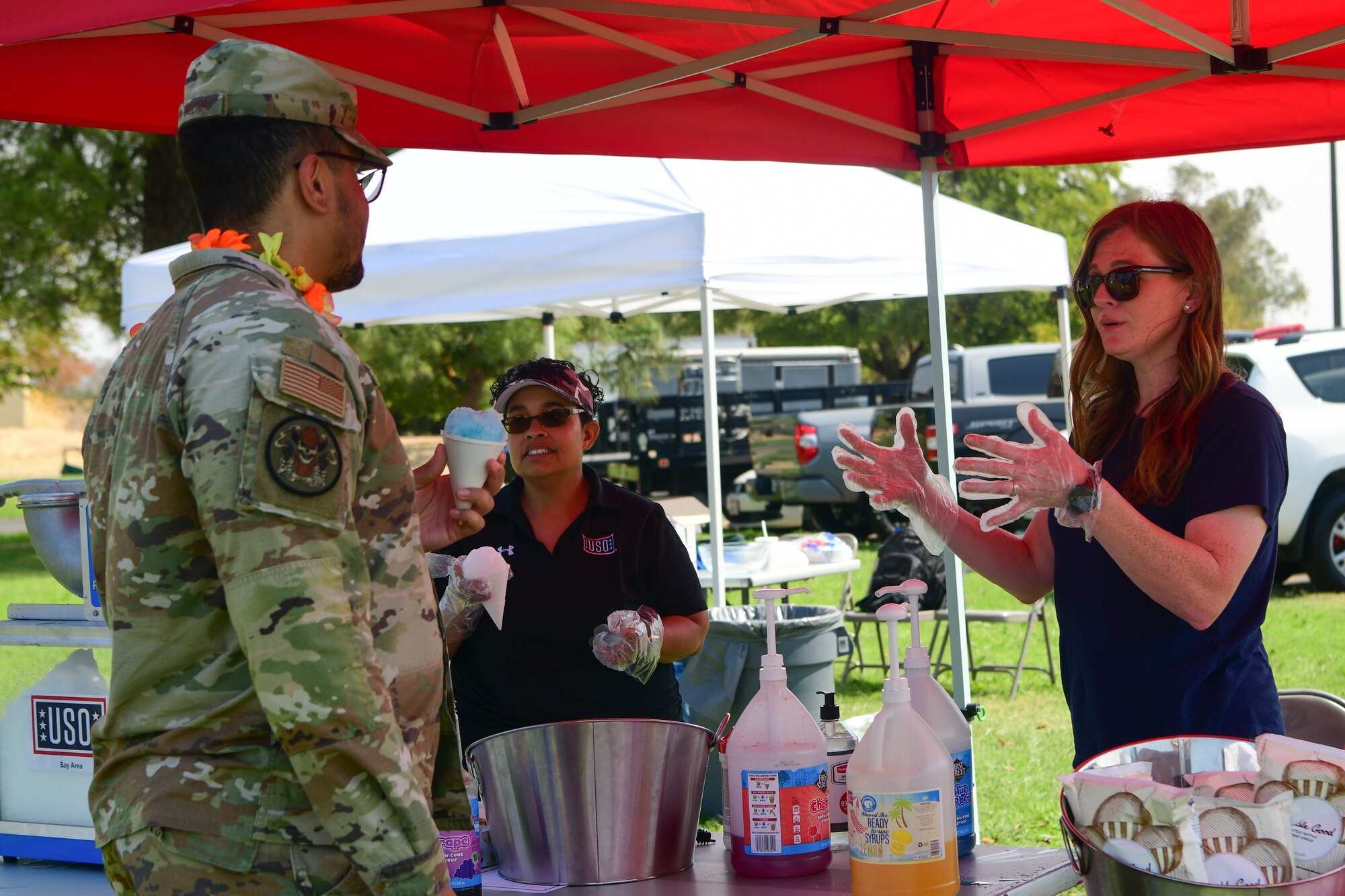 The Beale Air Force Base United Services Organization passes out snow cones for Recce Connect Day at Beale Air Force Base, Cali. on Sept. 16, 2022.