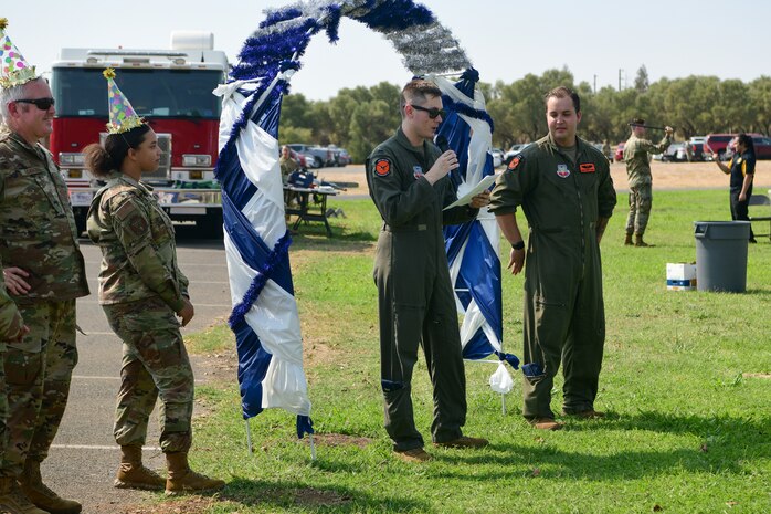 Lt. Christian Peardon opens the cake cutting ceremony at Beale Air Force Base, Cali. on Sept. 16, 2022