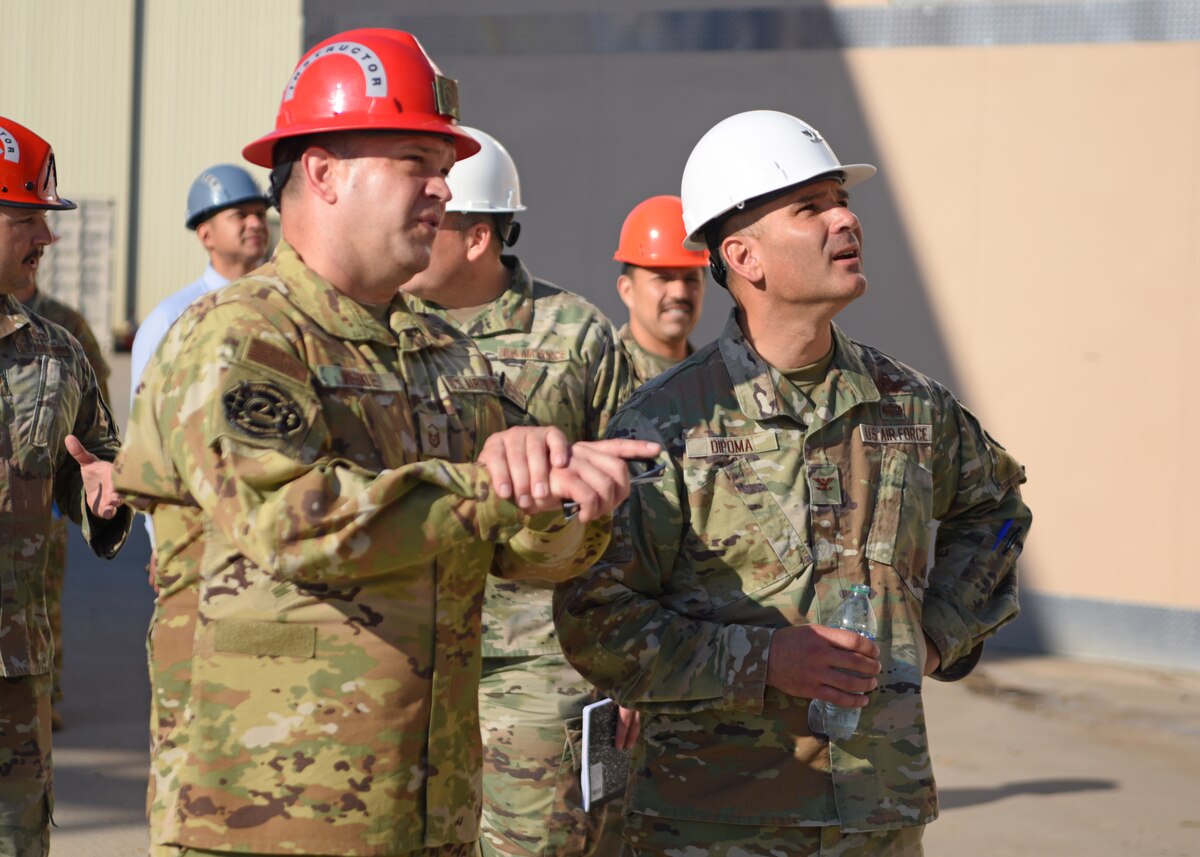 U.S. Air Force Master Sgt. Andrew Kehoe, 312th Training Squadron instructor, briefs Col. Nicholas Dipoma, Second Air Force vice commander on firefighter training at the Louis F. Garland Department of Defense Fire Academy, Goodfellow Air Force Base, Texas, Sept. 14, 2022. Dipoma assists in overseeing all aspects of basic and technical training in Air Education and Training Command. (U.S. Air Force photo by Senior Airman Ethan Sherwood)