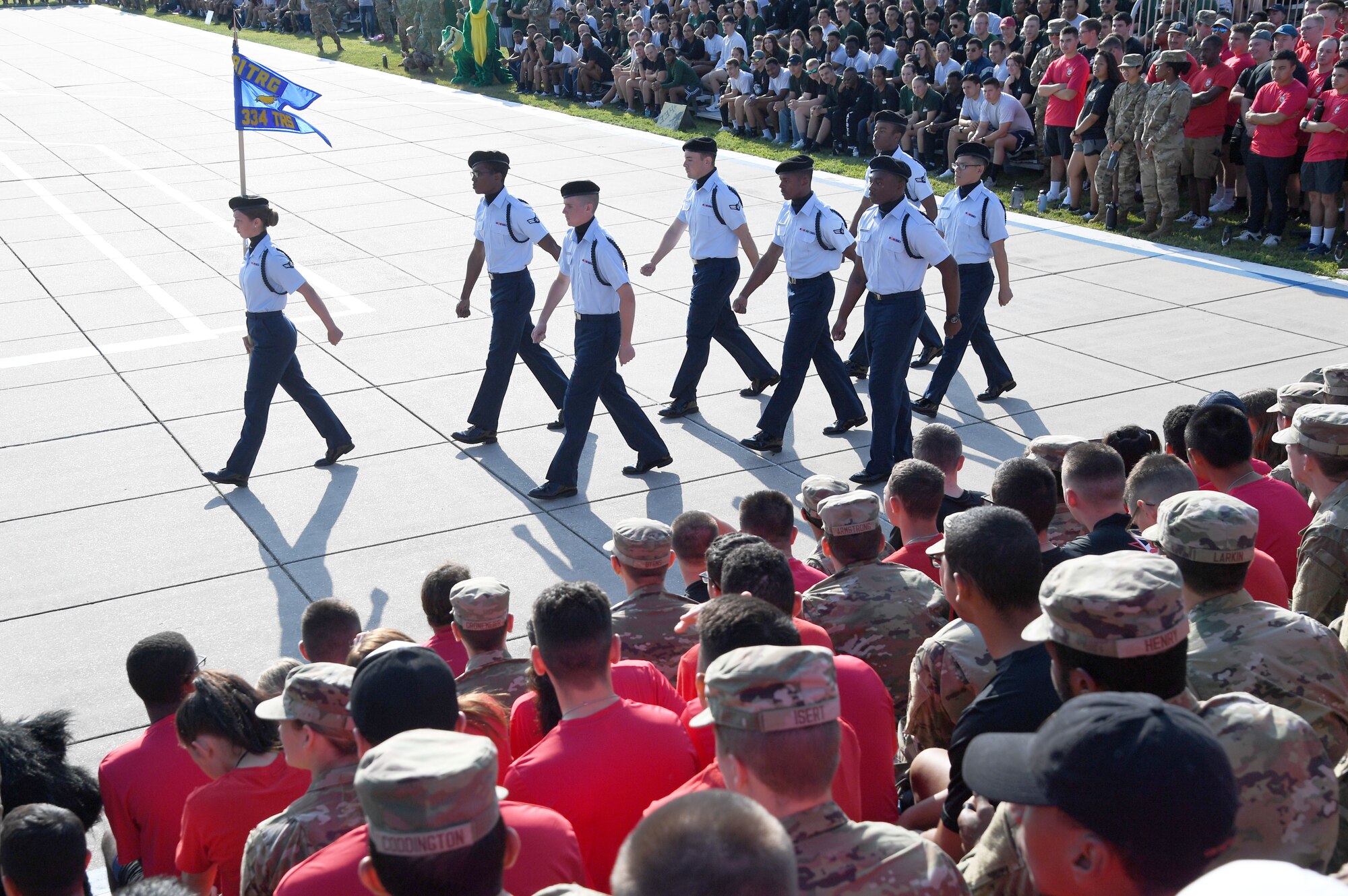 Members of the 334th Training Squadron regulation drill team perform during the 81st Training Group drill down on the Levitow Training Support Facility drill pad at Keesler Air Force Base, Mississippi, Sept. 16, 2022. Keesler trains more than 30,000 students each year. While in training, Airmen are given the opportunity to volunteer to learn and execute drill down routines. (U.S. Air Force photo by Kemberly Groue)