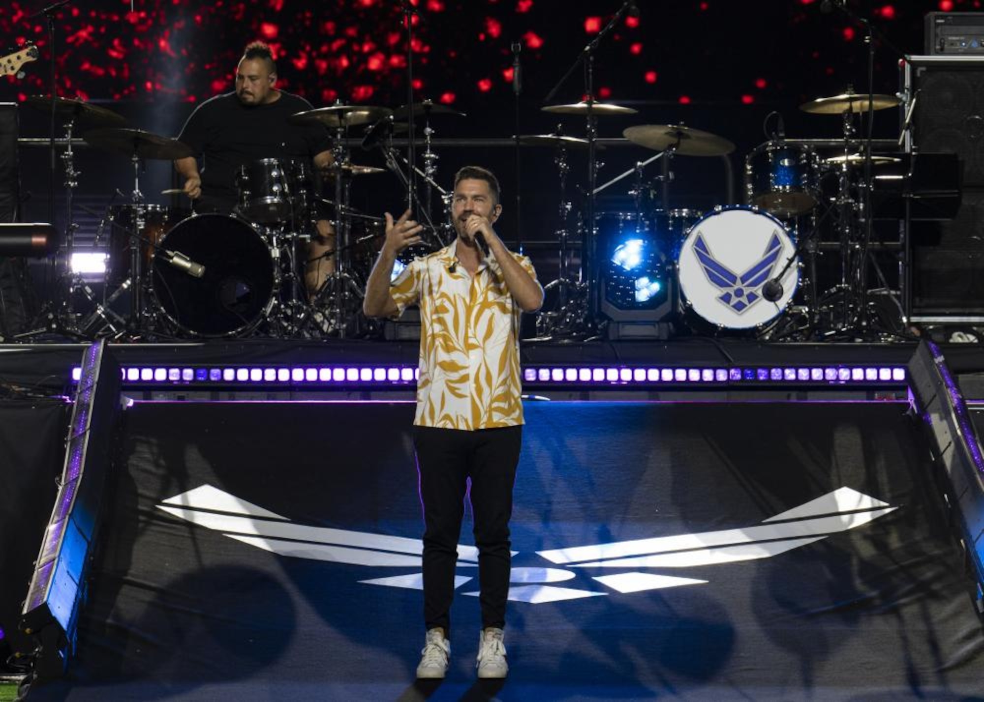 Multi-platinum singer-songwriter Andy Grammer performs at the Air Force 75th Anniversary Tattoo Sept. 15, 2022, at Audi Field, Washington, D.C. Key features of the Tattoo included performances by the Band, the Honor Guard, Andy Grammer, speeches from honored members of the Air Force, and aerial entertainment. (U.S. Air Force photo by Amn Bill Guilliam)