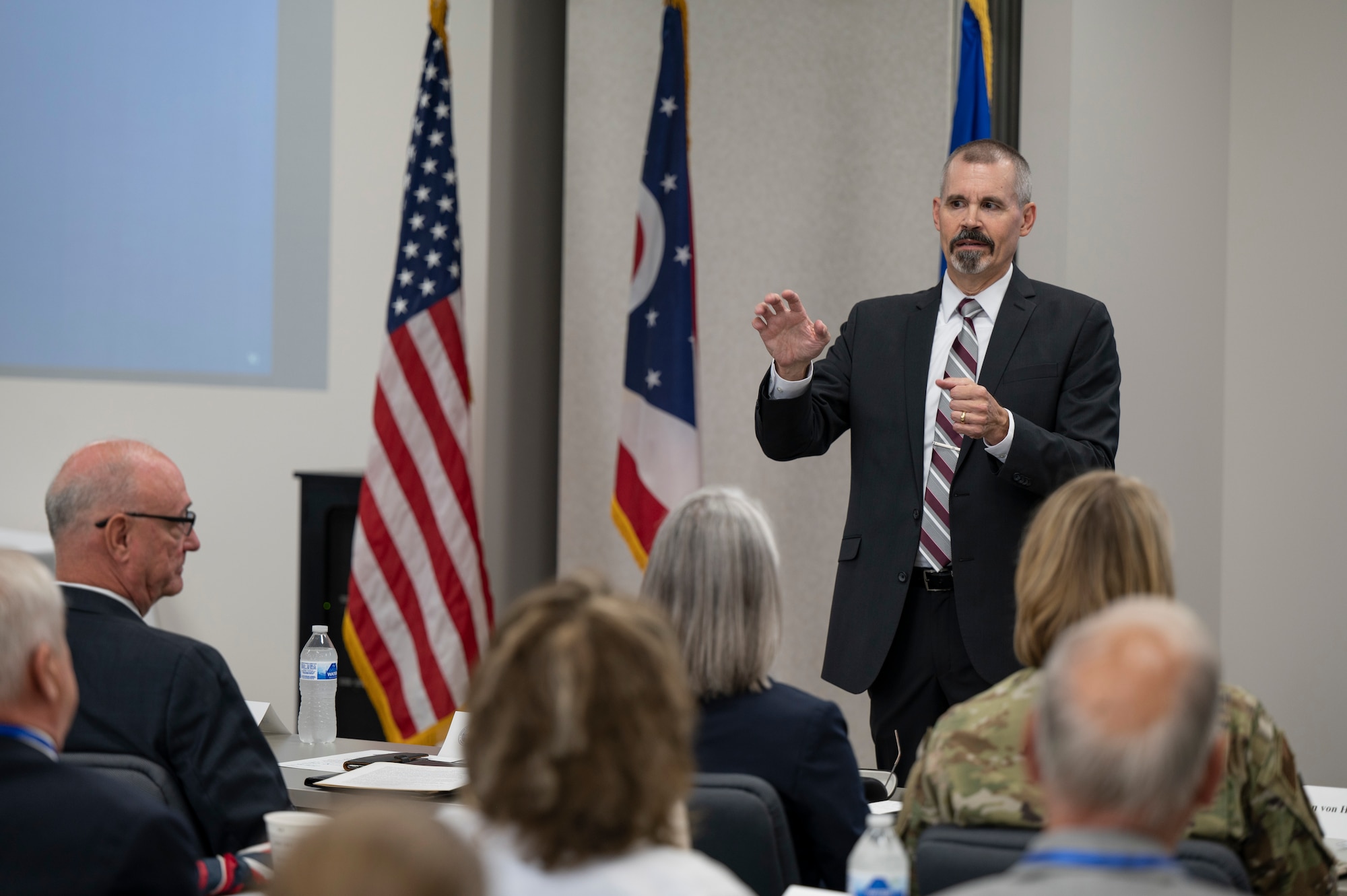 Carl Unholz, Air Force Metrology and Calibration Program director, speaks during a commemoration ceremony at the Air Force Primary Standards Lab at Heath, Ohio Sept. 12, 2022.