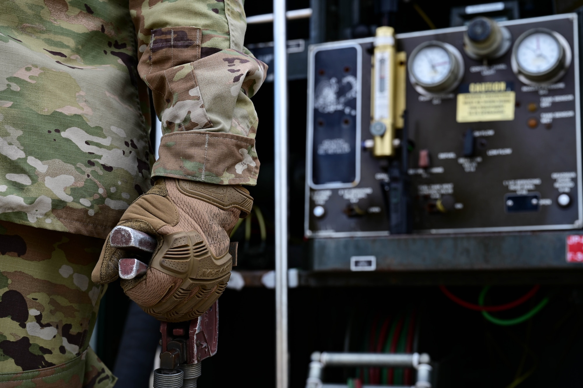 hand holding a fuel pump.