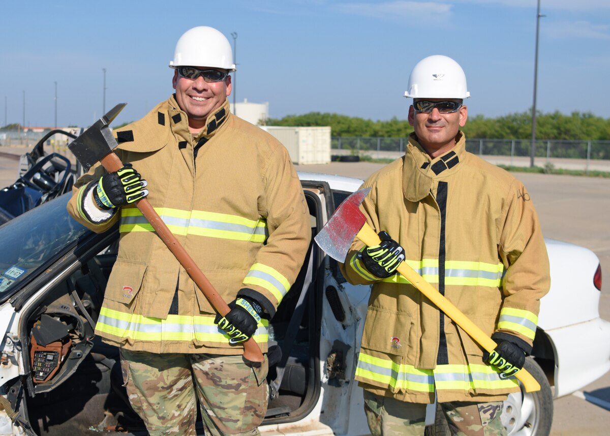U.S. Air Force Col. Nicholas Dipoma, Second Air Force vice commander, and Maj. Richard Cordova, Second Air Force A9, pose for a photo at the Louis F. Garland Department of Defense Fire Academy, Goodfellow Air Force Base, Texas, Sept. 14, 2022. Dipoma and Cordova were immersed in different training around Goodfellow to become more familiar with the 17th Training Wing’s mission. (U.S. Air Force photo by Senior Airman Ethan Sherwood)