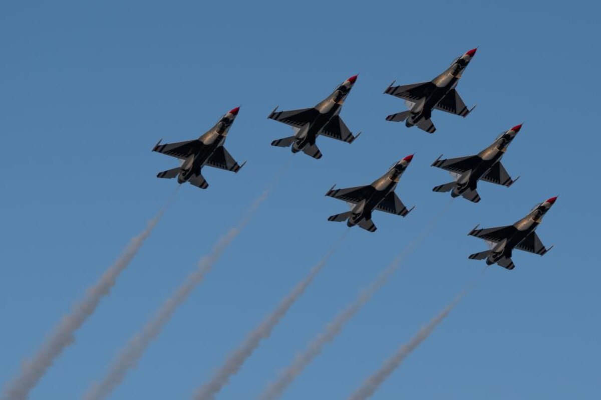 The U.S. Air Force Thunderbirds fly over the Air Force 75th Anniversary Tattoo Sept. 15, 2022, at Audi Field, Washington, D.C. The Thunderbirds serve as the Air Force’s precision-flying demonstration team, entrusted to perform for people all around the world to display the pride, precision and professionalism the Air Force represents. (U.S. Air Force photo by Kristen Wong)