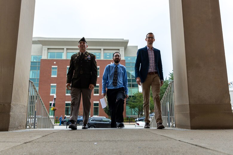 Pittsburgh District Commander Adam Czekanski, Economist Gabriel Stala and Plan Formulator Eric Merriam enter the Indiana County Court House in Indiana, PA, Sept. 14, 2022. Col. Czekanski signed a $426,000 federal cost-share agreement for a Section 22 Planning Assistance to States project to develop a stormwater management plan for the Indiana County community. Section 22 projects allow the Corps of Engineers to partner with local communities to provide engineering assistance and expertise to address local challenges. (U.S. Army Corps of Engineers Pittsburgh District photo by Andrew Byrne)