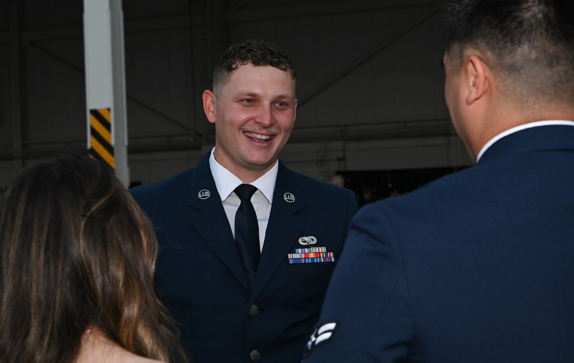 Airmen converse at the Air Force Ball at Whiteman Air Force Base, Missouri, September 16, 2022. The U.S. Air Force has been around for 75 years now, with the AF Ball celebrating it's anniversary. (U.S. Air Force photo by Airman 1st Class Joseph Garcia)