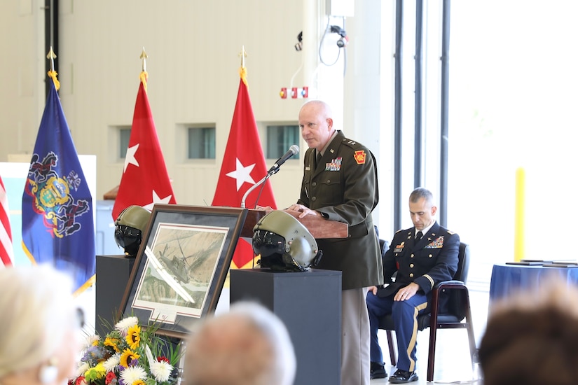 A new helicopter training landing pad at Muir Army Airfield is dedicated to Chief Warrant Officer 3 Matthew Ruffner and Chief Warrant Officer 2 Jarett Yoder during a ceremony in the Aviation Maintenance Instruction Building here.