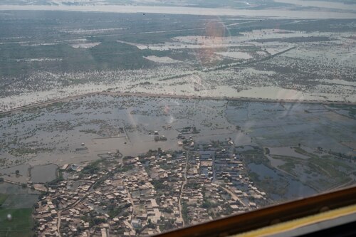 An aerial photo of flooding in the Sindh region of Pakistan taken during a USAID-led humanitarian mission to deliver equipment to the region, Sep. 10, 2022. USAID leads the U.S. Government's international development and disaster assistance, helping people emerge from humanitarian crises, such as the catastrophic flooding currently plaguing Pakistan. (U.S. Air Force photo by Staff Sgt. Cassandra Johnson)