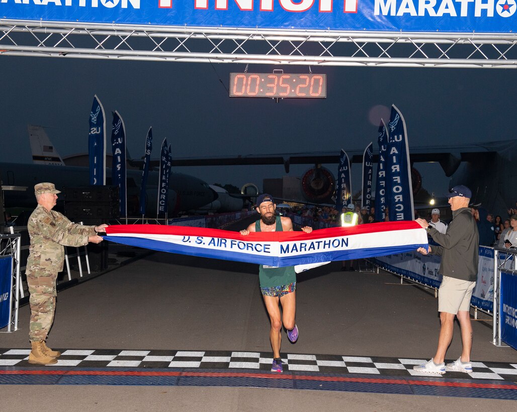 Brandon Hough crosses the finish line in 39 minutes, 57 seconds to win the men's 10K in the Air Force Marathon's first race Sept. 17. The 10K took place as part of the 26th annual Air Force Marathon events at the National Museum of the U.S. Air Force at Wright-Patterson Air Force Base, Ohio.