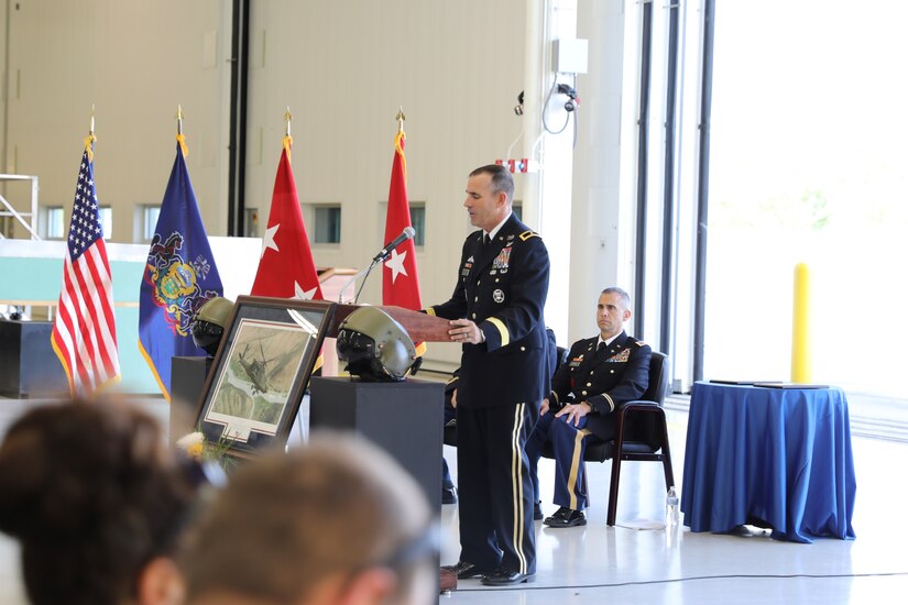 A new helicopter training landing pad at Muir Army Airfield is dedicated to Chief Warrant Officer 3 Matthew Ruffner and Chief Warrant Officer 2 Jarett Yoder during a ceremony in the Aviation Maintenance Instruction Building here.