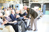 A new helicopter training landing pad at Muir Army Airfield is dedicated to Chief Warrant Officer 3 Matthew Ruffner and Chief Warrant Officer 2 Jarett Yoder during a ceremony in the Aviation Maintenance Instruction Building here.