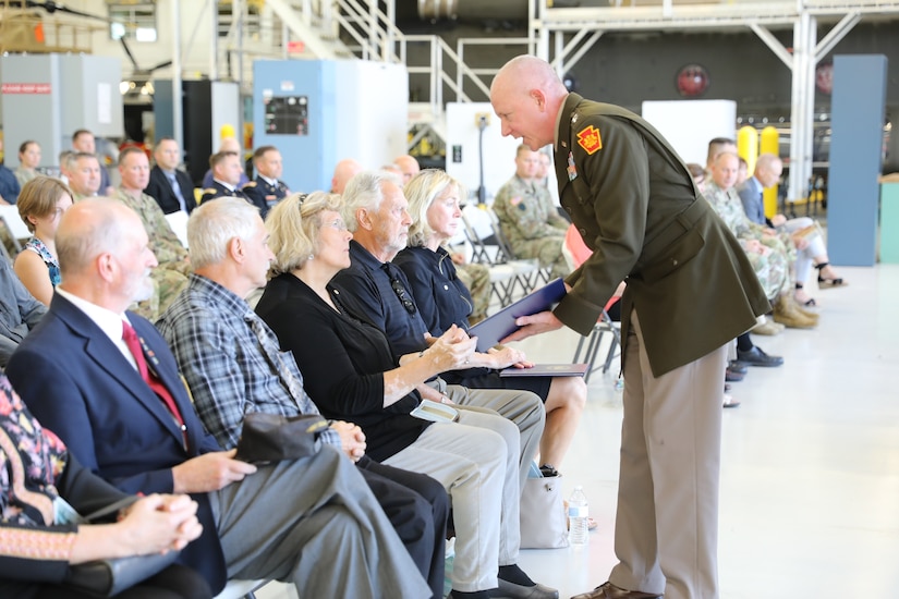 A new helicopter training landing pad at Muir Army Airfield is dedicated to Chief Warrant Officer 3 Matthew Ruffner and Chief Warrant Officer 2 Jarett Yoder during a ceremony in the Aviation Maintenance Instruction Building here.