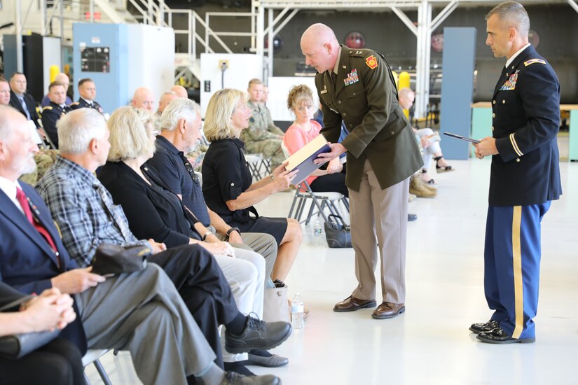 A new helicopter training landing pad at Muir Army Airfield is dedicated to Chief Warrant Officer 3 Matthew Ruffner and Chief Warrant Officer 2 Jarett Yoder during a ceremony in the Aviation Maintenance Instruction Building here.