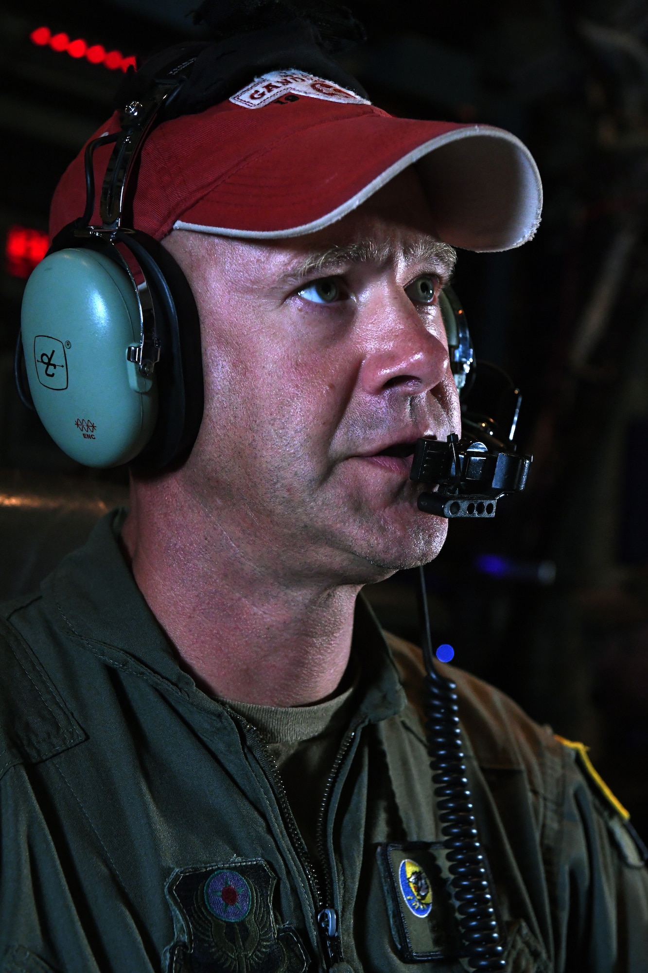 U.S. Air Force Master Sgt. David Heine, an Electronic Communication Systems operator with the 193rd Special Operations Group, guides the final EC-130J Commando Solo aircraft training flight as the mission chief in Middletown, Pennsylvania, Sept. 17, 2022.