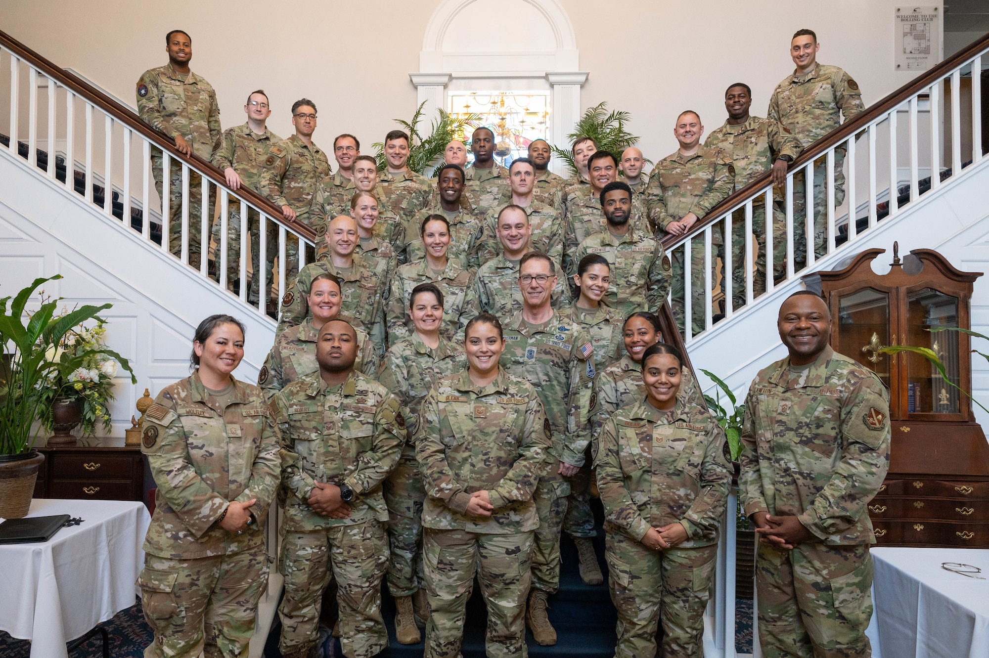 Seminar attendees and guest speakers pose for a group photo after the final day of a Senior NCO professional enhancement seminar, Aug. 18, 2022, at Joint Base Anacostia-Bolling, Washington D.C. Upon completion of the seminar, master sergeant selects were celebrated on Aug. 12, 2002 during JBAB’s first Senior NCO Induction Ceremony since-lead transfer in 2020. (U.S. Air Force photo by Staff Sergeant Nilsa Garcia)