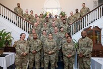 Seminar attendees and guest speakers pose for a group photo after the final day of a Senior NCO professional enhancement seminar, Aug. 18, 2022, at Joint Base Anacostia-Bolling, Washington D.C. Upon completion of the seminar, master sergeant selects were celebrated on Aug. 12, 2002 during JBAB’s first Senior NCO Induction Ceremony since-lead transfer in 2020. (U.S. Air Force photo by Staff Sergeant Nilsa Garcia)